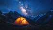 © Sirinya - A cozy illuminated tent set on a mountain slope with a stunning starry sky and Milky Way galaxy overhead.
