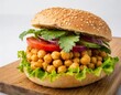 © Arfin Studio - Delicious Chickpea Burger with Fresh Toppings Isolated on a White Background
