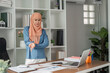 © wichayada - Muslim woman in hijab expressing frustration during business presentation in office.