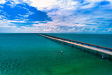 Aerial Drone image of the Seven Mile, 7-Mile bridge spanning the clear turquoise waters of the tropical Florida Keys on the way to Key West