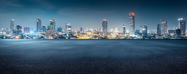 a panoramic nighttime view of a vibrant city skyline in the distance