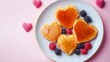 © Halo Vision - Heart Shaped Pancakes with Berries and Syrup