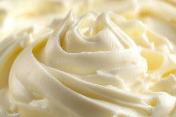 Poster - Creamy texture of freshly whipped cream with smooth swirls photographed up close in a kitchen setting