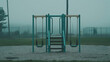 © Chantanapa - Empty playground swings in misty atmosphere during early morning