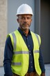 © haiqiang - arafed man wearing a hard hat and safety vest