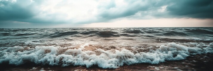 Aufkleber - Lonely seashore with gentle waves and overcast sky invites reflection in open space Generative AI