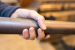 © auremar - metalworkers hand on iron bar