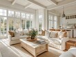 © RaksaLinggo - A bright and spacious living room with white furnishings and large windows
