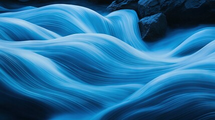 Wall Mural - a detailed image of a water stream flowing near rocks and a prominent foreground rock formation