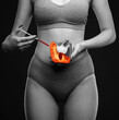 © Dimid - A woman holds red pepper in her hands and makes injections for rejuvenation. The concept of plastic surgery.
