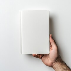 Aufkleber - Stylish hand presenting a sleek white book against a minimalistic light background for design use : Generative AI