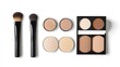 © Anak - Makeup brushes and compact powders displayed on a white background