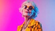 © Mas - Stylish elderly woman posing confidently in vibrant colors