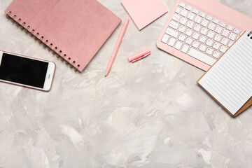 Wall Mural - computer keyboard, notebook and stationery on grunge background