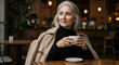 © Elio - Attractive Older Woman Enjoying Coffee in Fashionable Style
