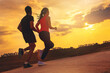 © Panumas - Silhouette of young couple running together on road across the bridge. Couple, fit runners fitness runners during outdoor workout