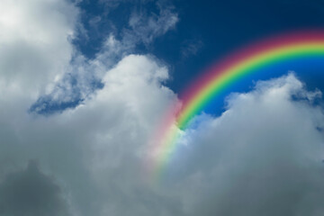 blue sky cloud with rainbow
