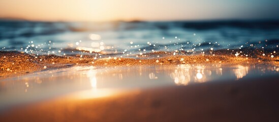 Fototapete - Bokeh effect on tropical beach with soft golden and blue hues, sunlit water creating a dreamy scene, blurred foreground and mesmerizing shoreline.