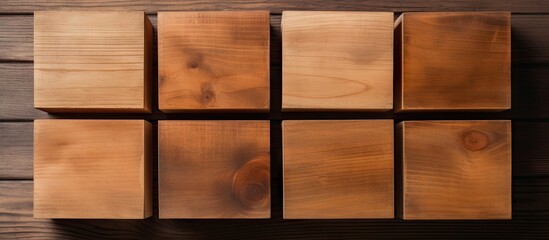 Poster - Isolated wooden box layout featuring eight evenly aligned wooden blocks on a dark wooden surface with ample copy space for design elements.