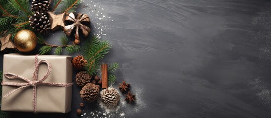 Poster - Elegant rustic Christmas composition featuring a wrapped gift with a bow on a dark textured background, adorned with festive ornaments and pine.