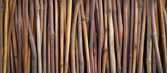 Fototapete - Natural reed weaving texture displayed in warm brown hues with vertical lines, creating an organic backdrop for rustic design projects.