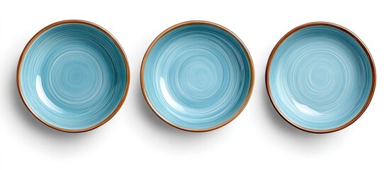 Poster - Set of three round ceramic plates in vibrant blue tones arranged in a row on a clean white background showcasing their smooth surfaces and design.