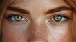 © Vii - A close-up shot of a woman's eyes featuring freckles