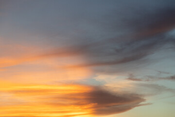 Wall Mural - the sky is filled with clouds and the sun is setting