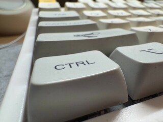 white ctrl key at close range on mechanical keyboard for programmer