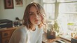 © Andrew - Serene Sunlight: A woman gazes thoughtfully into the lens, bathed in natural light filtering through a window, creating a soft, intimate atmosphere.