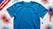 © Aida - A blue t-shirt is laying on a table