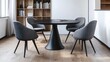 © lestari - Modern round dining table with chairs in a light-filled room.  Possible use Interior design, furniture catalog