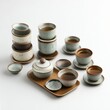 © DipLab - Rustic Ceramic Tea Set on White Background