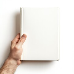 Leinwandbilder - A hand holding a blank white notebook against a clean backdrop for creative design concepts : Generative AI