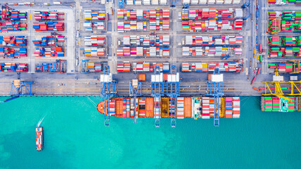 Fototapete - Deep-sea port, cargo ships dock, transport goods, containers load and unload ships, import and export goods.
