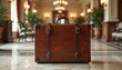 © miss irine - Vintage suitcase with leather straps stands alone in grand hotel lobby. Elegant decor travel nostalgia. Adventure from past times, classic journey stylish wanderlust. Heritage cultured elegance