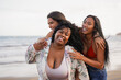 © Sabrina - Group of diverse girls having fun together on the beach during travel vacation - Latin women and holiday concept