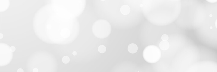 Grey bokeh background, blurred circles, soft light, website design