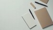 © Andrew - Stationery Essentials on desk: A flat lay composition of essential stationery items elegantly arranged on a surface, ready for work or creative expression.