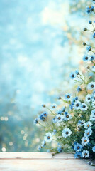Poster - Beautiful blue flowers growing on a wooden table with bokeh background, creating a serene and natural scene