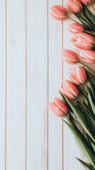 Poster - Pink tulips lying on white wooden table creating a delicate spring or easter background with copy space