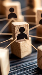 Leinwandbilder - Wooden cubes linking human icons, networking social connections and collaborative teamwork between individuals