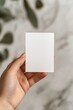 © Generative AI - Hand holding a blank card representing creativity and potential for design or messaging : Generative AI