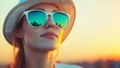 © Yuparet - Golden Hour Portrait of Woman Outdoors in Stylish Sunglasses with Stunning Sunset Background