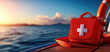 © Oatkhaphon - red first aid kit on yacht, symbolizing marine emergency preparedness