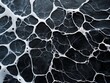 © VISUAL BACKGROUND - A close up of a black and white marble surface with bubbles