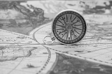 Wall Mural - classic round compass on background of old vintage map of world