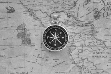 Wall Mural - classic round compass on background of old vintage map of world