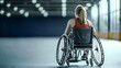 © reza - Determined Female Athlete in Wheelchair Contemplates Competition in Large Indoor Arena with Back View and Pixelated Effect