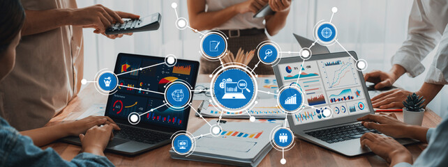Fototapete - Panorama shot analyst team utilizing BI Fintech to analyze financial report with laptop. Businesspeople analyzing BI power dashboard displayed on laptop screen for business insight. Scrutinize Amity